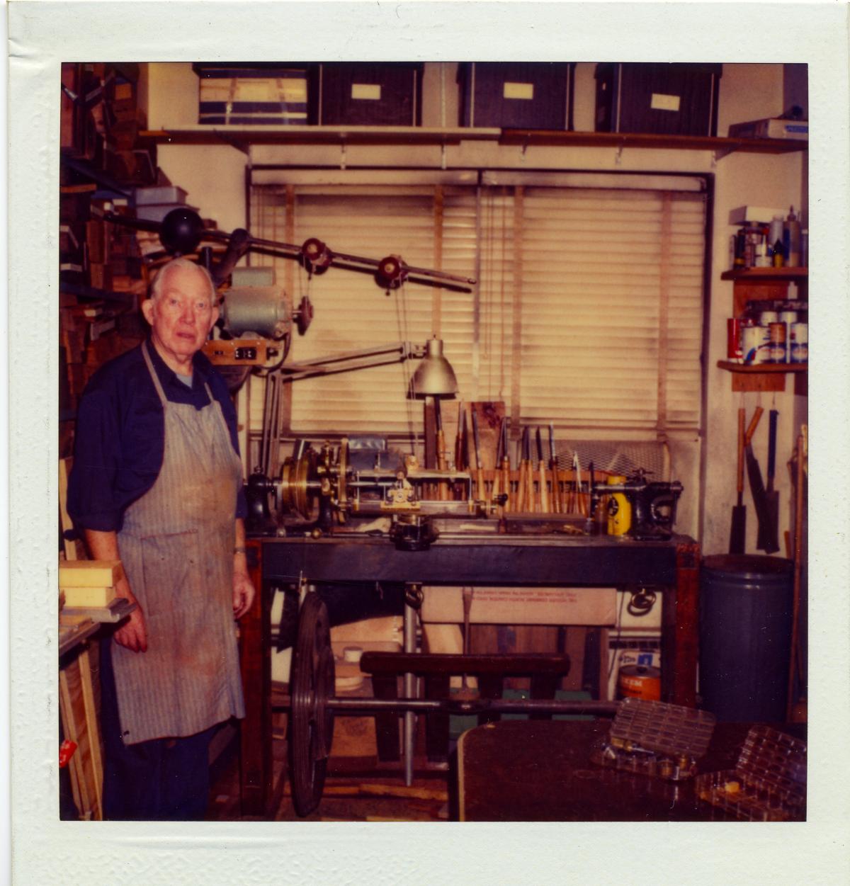 Frank Knox c. 1982 in his workshop in front of his ornamental turning lathe