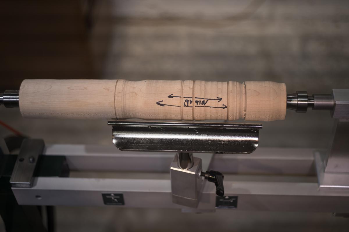 When spindle turning between centers you are always peeling perpendicular to the grain