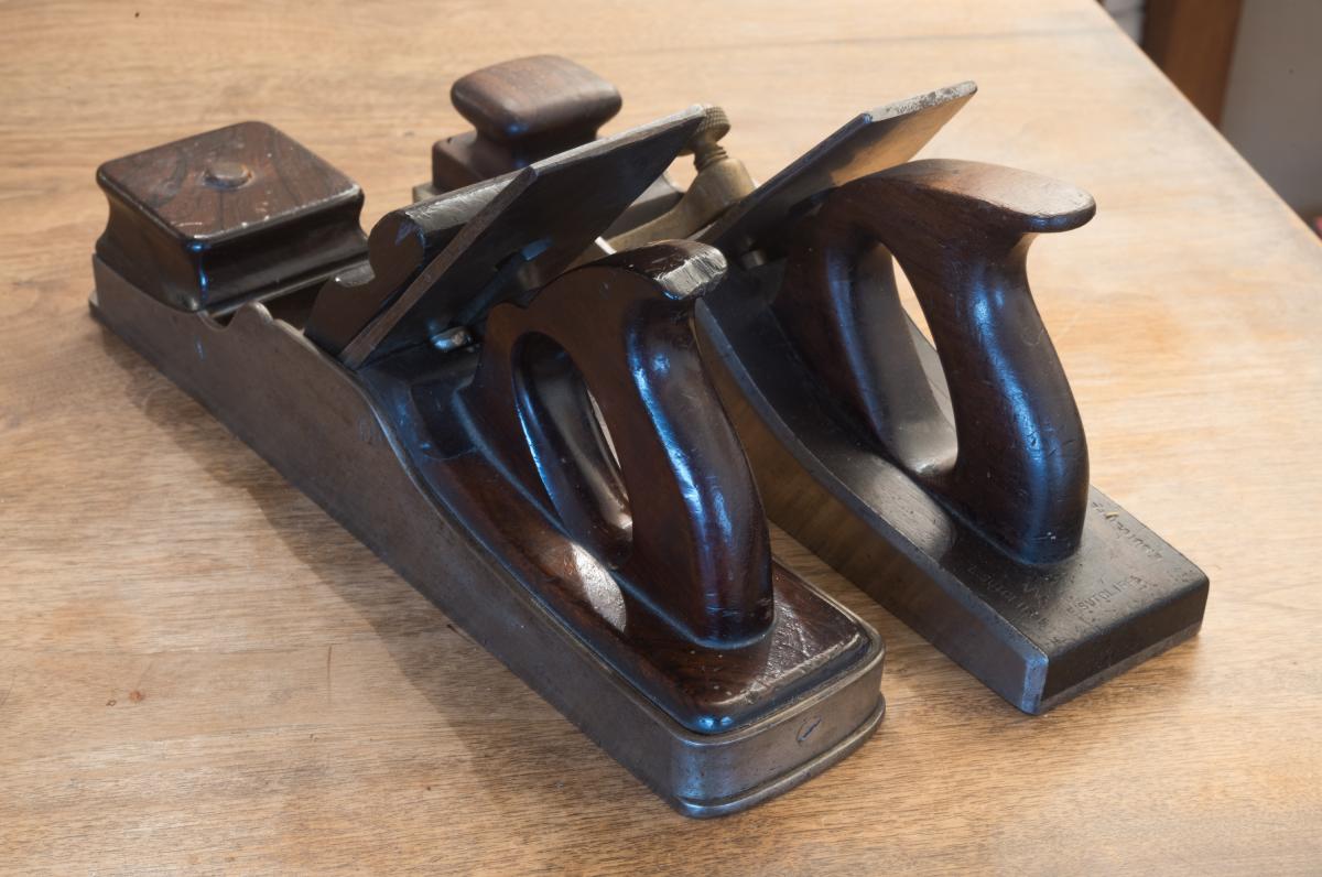 The back of the Towell plane with its bent around back compared to a similar size Norris panel plane C. 1910