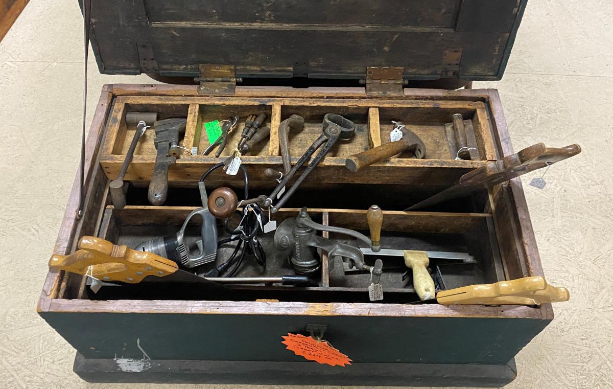 Traditional carpenter’s chest with tools and two trays