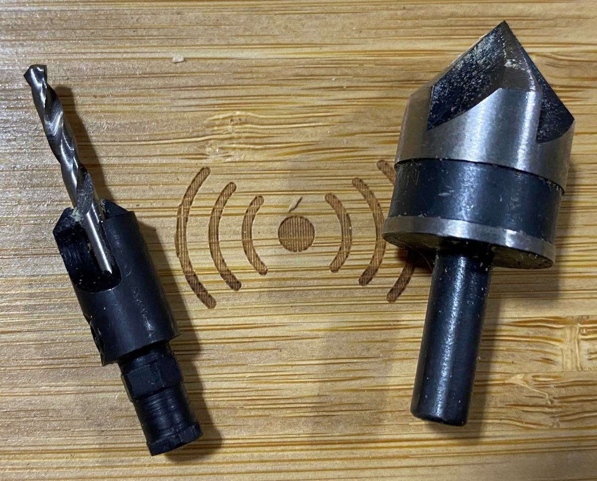 Countersink with pilot hole on the left