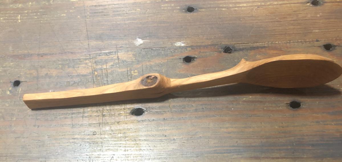Spoon made from found wood. At first I was pissed at the knot