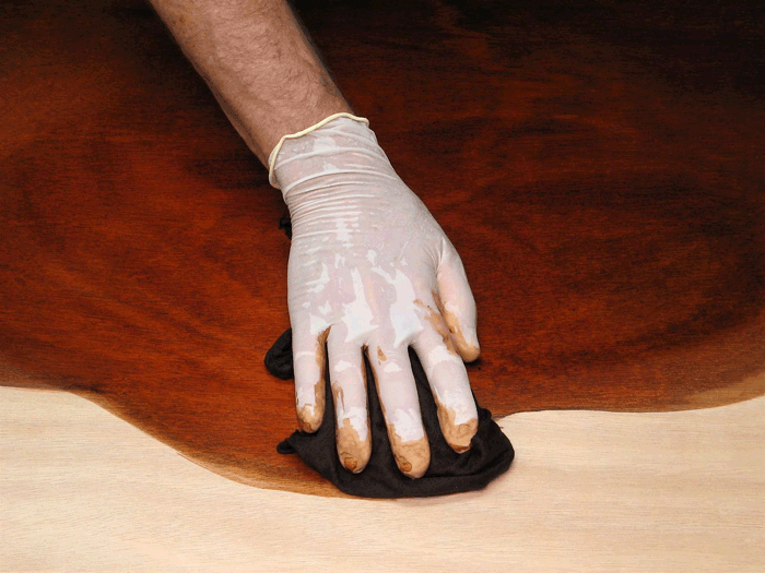 Applying Lockwood dye with a pad and gloves